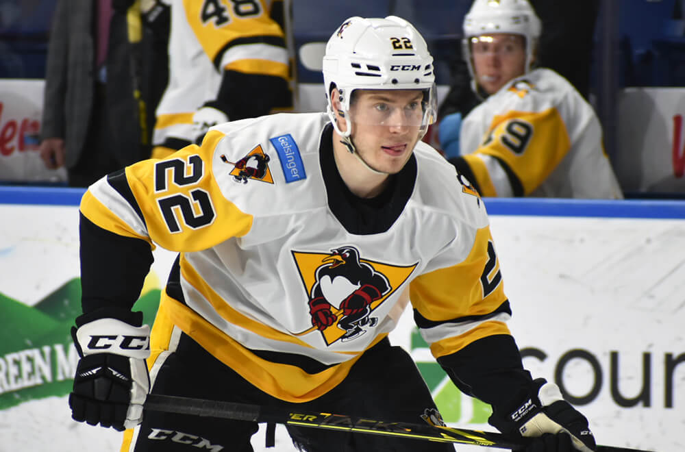 Penguins player on the ice.