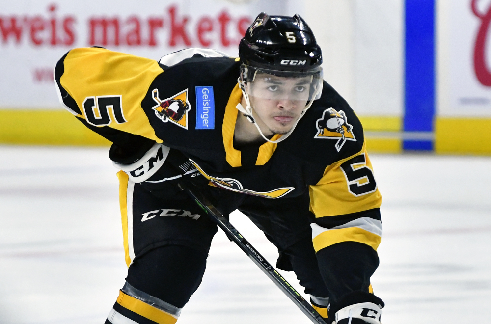 Penguins player Chris Ortiz on the ice.