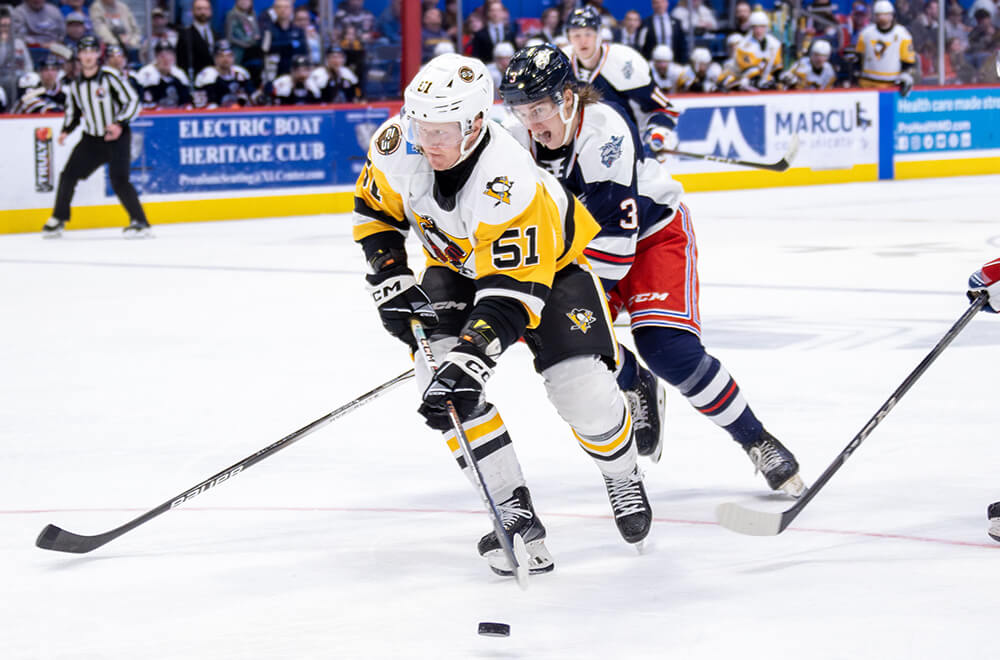 PENGUINS DROP THIRD-PERIOD SPRINT TO WOLF PACK, 3-2